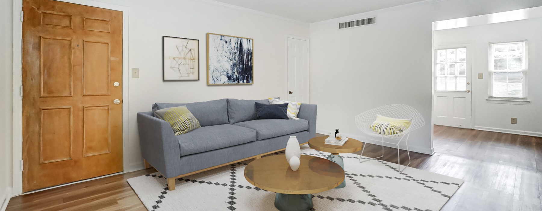 a living room with a couch and coffee table