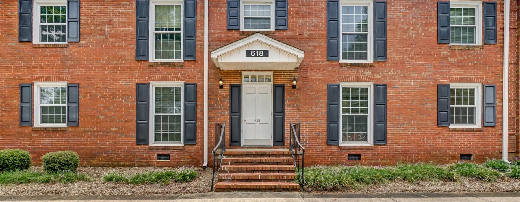 a brick building with a staircase