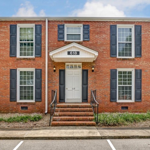a brick building with a staircase
